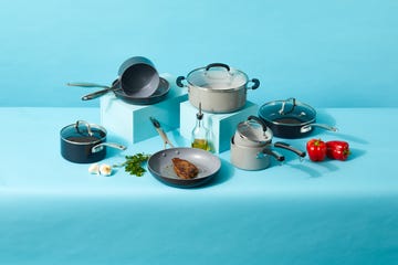 ceramic cookware pans on blue background