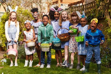 group of children having fun on an easter egg hunt