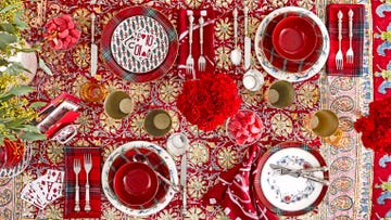 Decorative dining table setting with vibrant colors and festive elements