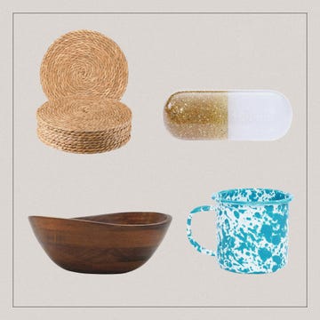 various items including woven mats a decorative pill a wooden bowl and a speckled mug