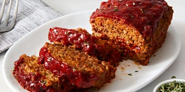 meatloaf sliced and topped with rosemary