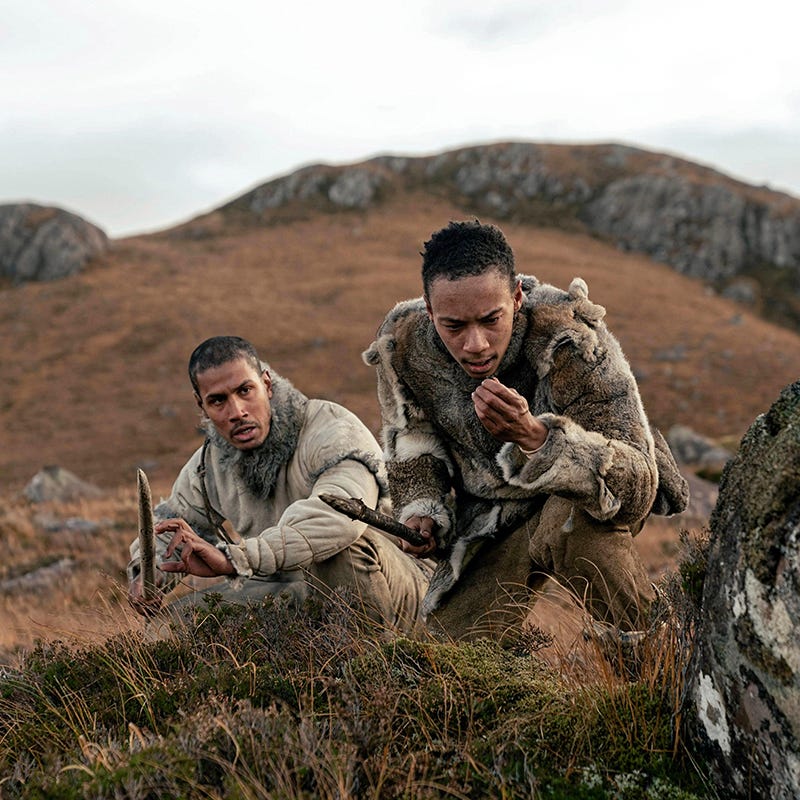 a group of men in camouflage