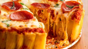 rigatoni topped with cheese and pepperoni then baked in a circle