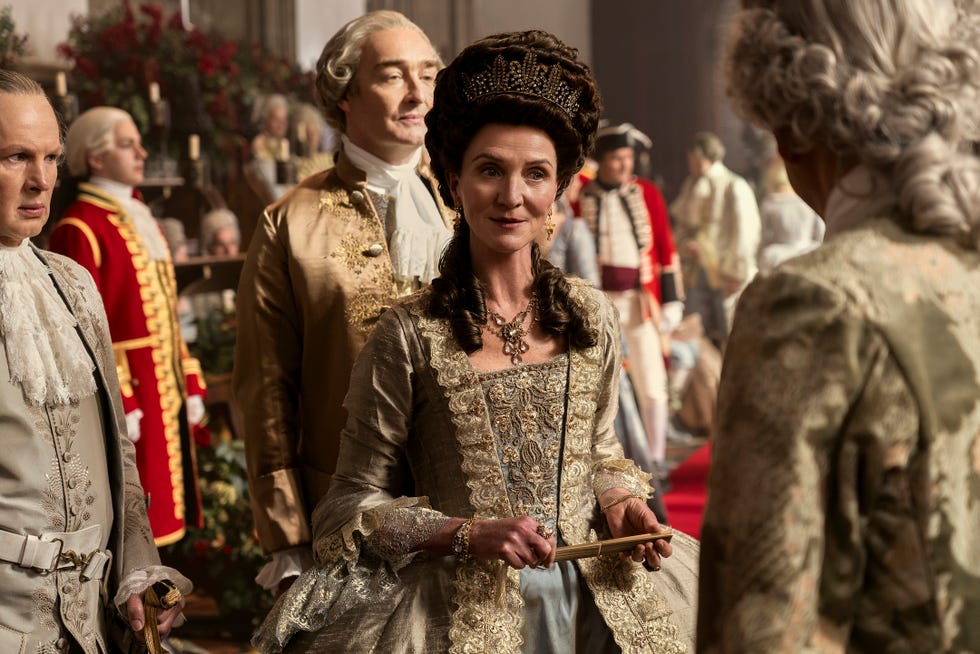 queen charlotte a bridgerton story l to r richard cunningham as lord bute, neil edmond as earl harcourt, michelle fairley as princess augusta in episode 101 of queen charlotte a bridgerton story cr liam danielnetflix © 2023