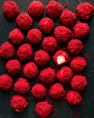 cheesecake bites rolled in red velvet cake pieces