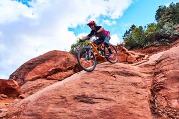 mountain biker navigating rocky terrain