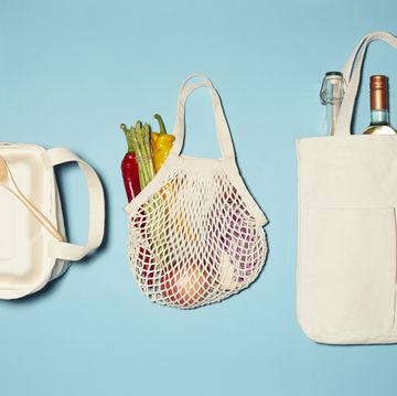 shopping bags with vegetables and wine