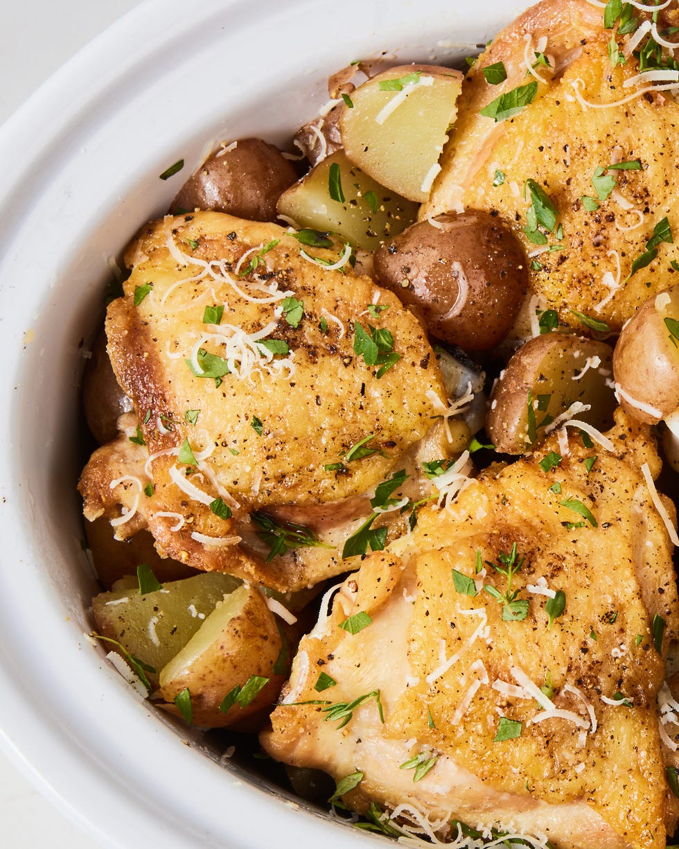 slow cooker garlic parmesan chicken with fresh herbs and potatoes