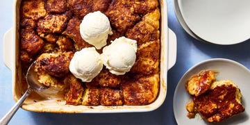 snickerdoodle mixture baked in a dish and topped with vanilla ice cream