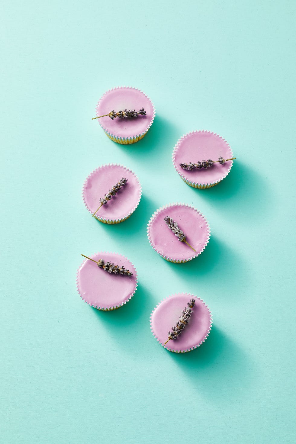 lavender cupcakes with sprigs of lavender on top