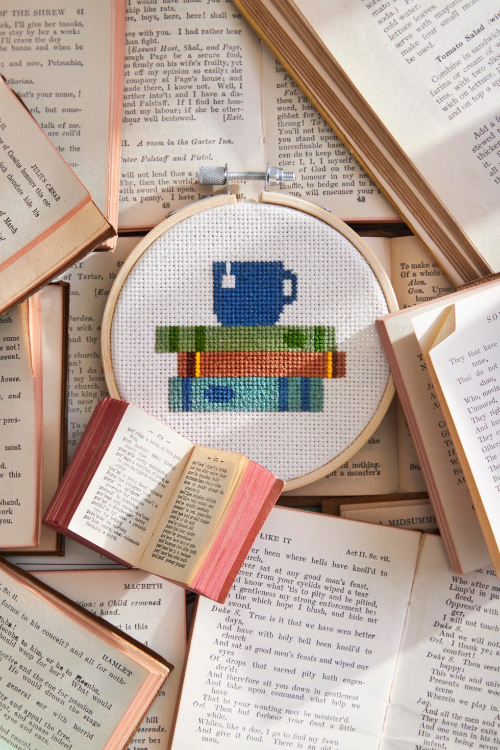 books and teacup cross stitch pattern