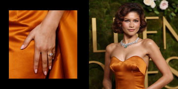 glamorous attire showcasing a diamond ring and necklace against a festive backdrop