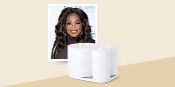 white stackable storage containers next to a blurred portrait