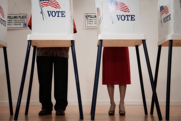 voters voting in polling place