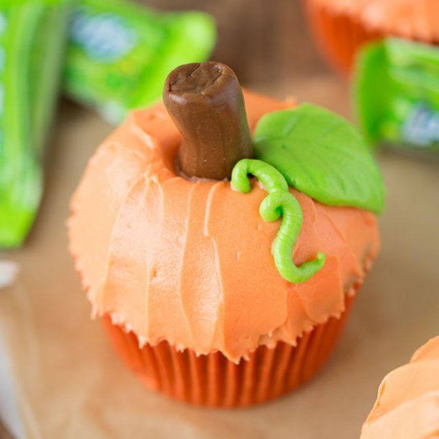 <p>Cover cupcakes with orange icing, stick a Tootsie Roll in the top, and — bam — you can check "make classroom cupcakes" off your To Do list. Bonus points if you want to draw on a leaf or two. </p><p><strong>Get the recipe at <a href="http://www.yourcupofcake.com/2015/09/pumpkin-patch-cupcakes.html" target="_blank">Your Cup of Cake</a>.</strong></p>