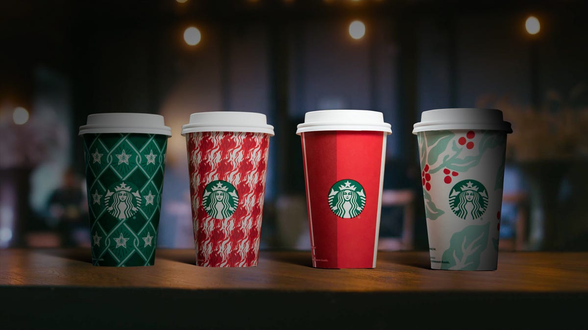 preview for Here's A Look Back At 21 Years Of Starbucks Holiday Cups