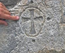 What appears to be a Templar cross carved into a rock