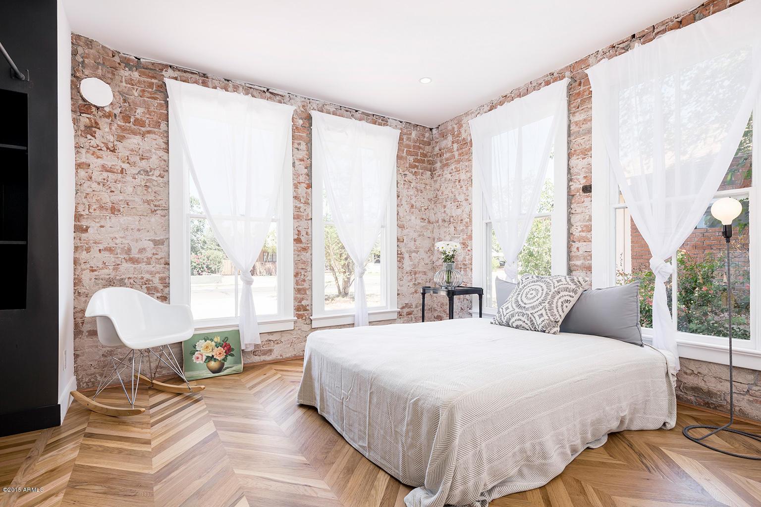 exposed brick bedroom