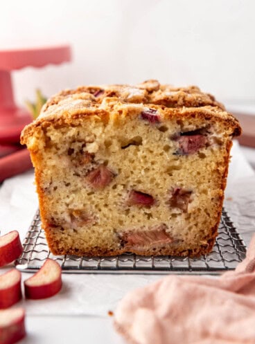 A side image of a sliced loaf of rhubarb bread.