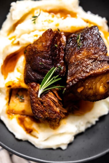 Braised short ribs on mashed potatoes.