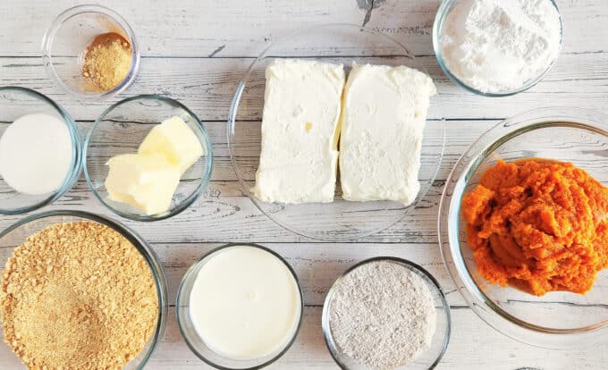 ingredients laid out on table for keto no bake pumpkin cheesecake. 