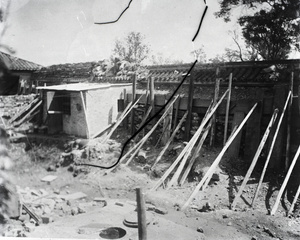 Reinforced outer wall, and water well, during siege of the Legation Quarter, Peking