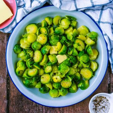 A bowl of microwave Brussels sprouts.