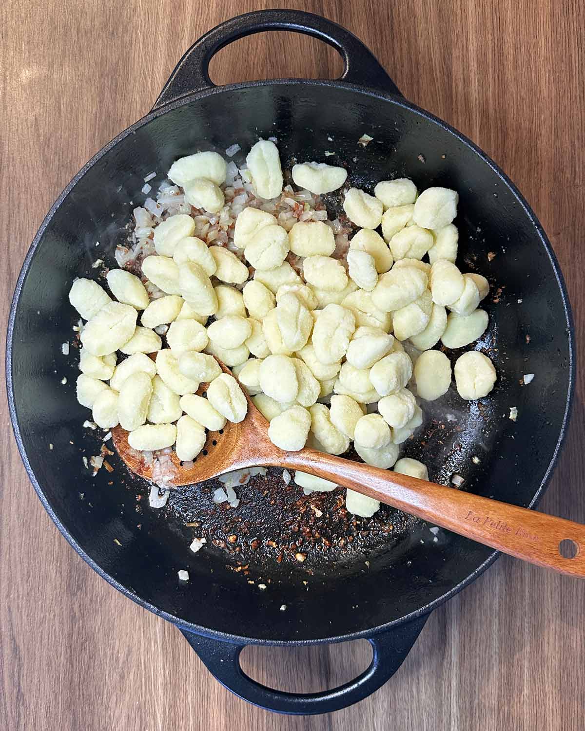 Gnocchi added to the pan.