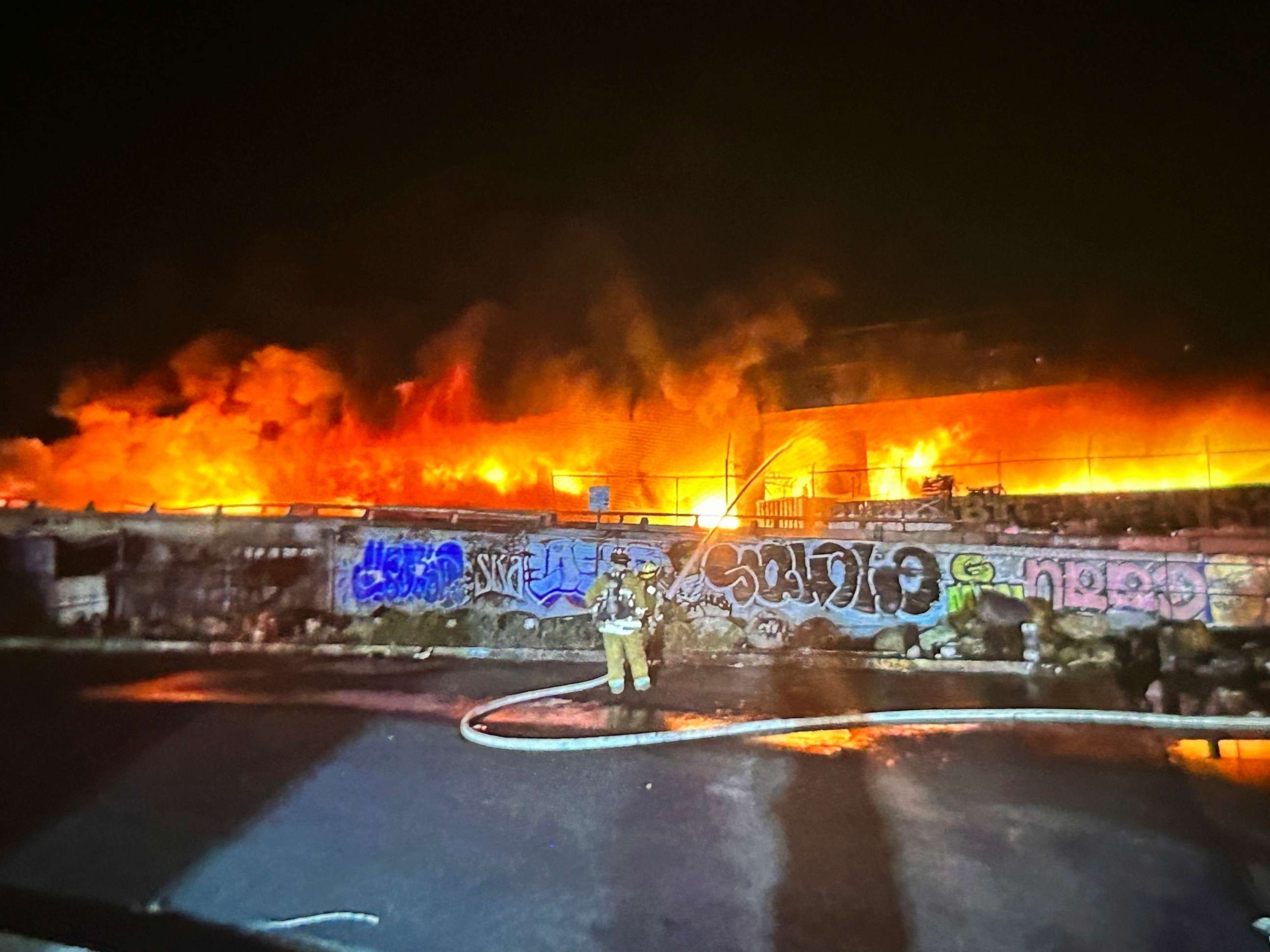 PHOTO: A fire along Interstate 10 near downtown Los Angeles, Nov. 11, 2023.