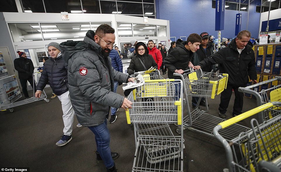 Black Friday, which is the day after Thanksgiving in the US, has been beset by violence and angry scenes in recent years but these shoppers looked more than happy to queue up