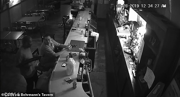 Video shows St. Louis man smoking a cigarette while an armed robber ...