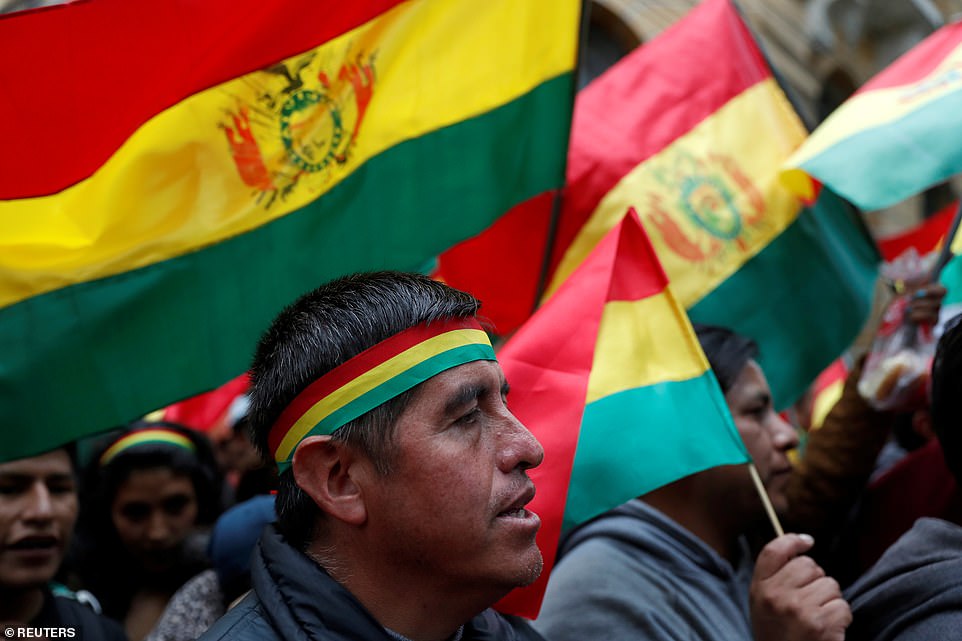 People shout slogans during a protest against Bolivia's President Evo Morales in La Pas on Saturday