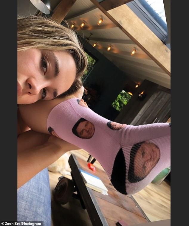 Let's face it: The British actress added a personal touch by donning pink socks bearing his face