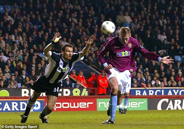 Crouch scores for Aston Villa in a Premier League match against Newcastle back in April 2002