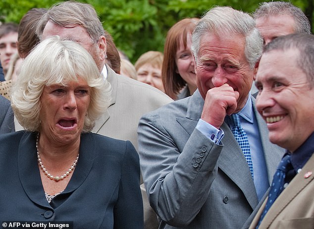 Camilla and Charles laughing during a quirky musical performance at Clarence House in London in 2010