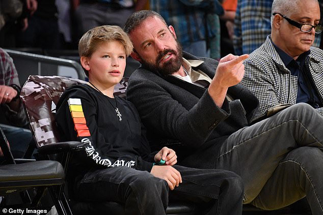 Ben Affleck's youngest child Samuel, 12, bears a striking resemblance to him ¿ but he's truly a mini-me to his famous mother; pictured Sunday in LA