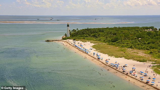 Key Biscayne, located on a barrier island across the Rickenbacker Causeway from Miami, is described as an 'an oasis of sandy beaches, nature preserves and restaurants with stunning views'