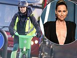 Minnie Driver ditches her Hollywood glam for a safety helmet and hi-vis jacket as she hops on a Lime bike in London