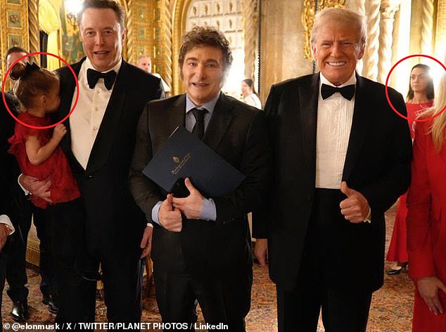 Elon Musk shared this image from the First Policy Insititute's black tie gala on Thursday at Mar-a-Lago, appearing to be holding his daughter Azure, with Neuralink executive and mother of three of his twelve children believed to be in the back