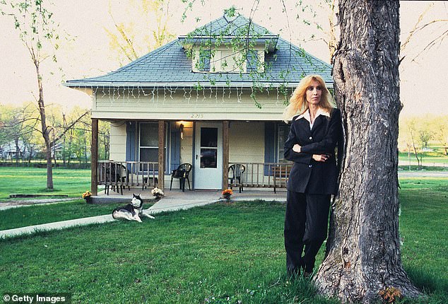 Nelson, pictured outside her Detroit home in 2005, said in 2022 that although she and her son were estranged, she was 'very, very proud' of his legendary rap career