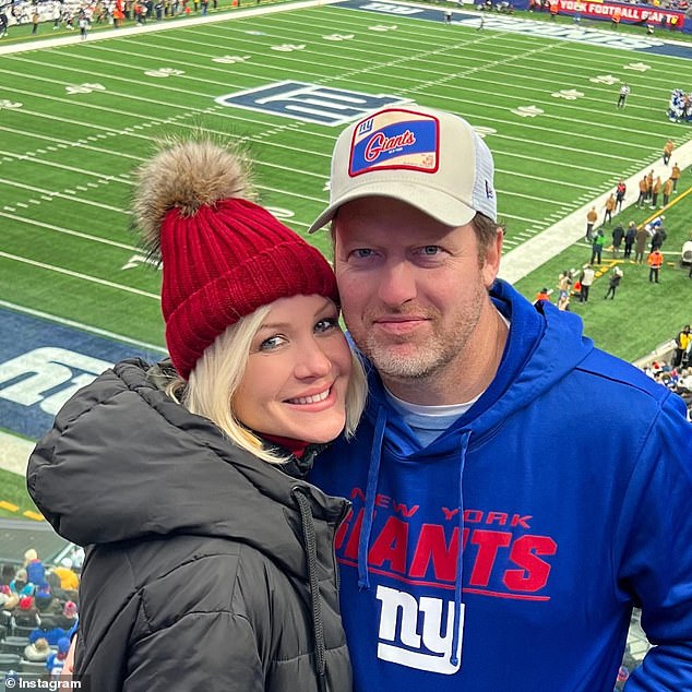 The accomplished doctor is pictured at a New York Giants game with her husband