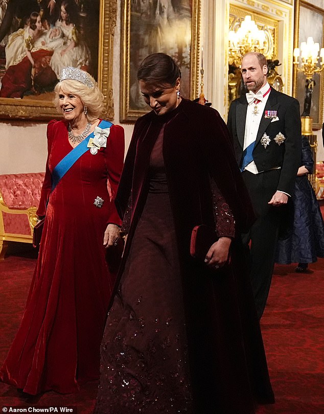 Queen Camilla with the Emir of Qatar's wife Sheikha Jawaher, followed by Prince William, as the royal procession headed towards the ballroom