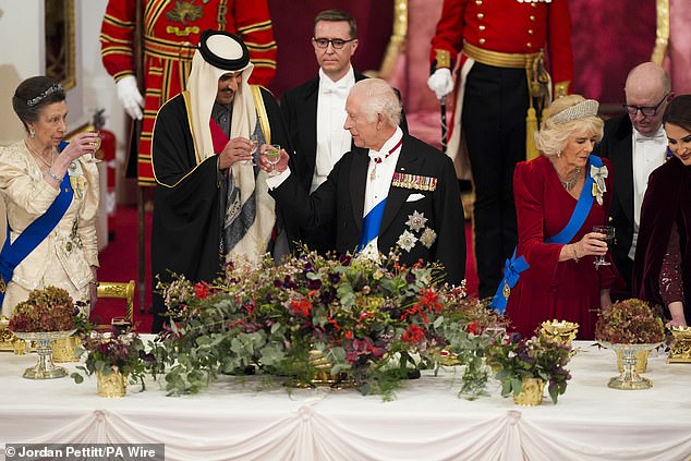 The royals photographed toasting to the UK and Qatar's long-standing friendship during the banquet held at Buckingham Palace