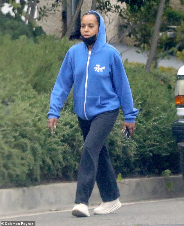 Kerry Washington, 47, kept a low profile as she enjoyed a walk in Los Angeles the day after Thanksgiving wearing a blue hoodie with a Jimmy Kimmel Live! logo on it, black sweat pants and white sneakers