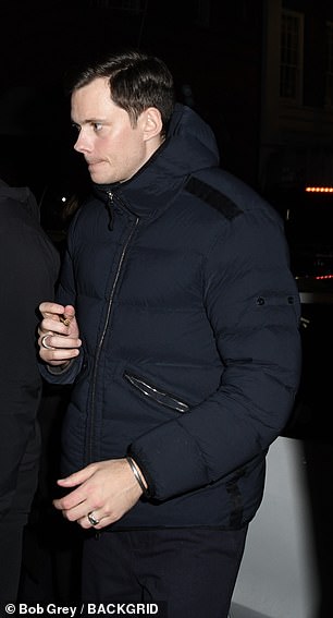 Bill Skarsgård, who stars as vampire Count Orlok, wrapped up in a navy padded coat