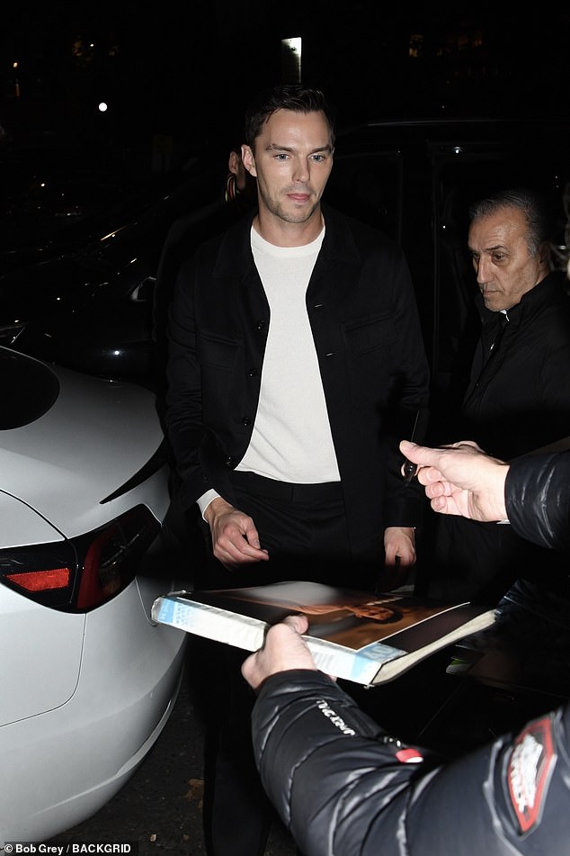 He was seen signing autographs for fans outside the venue