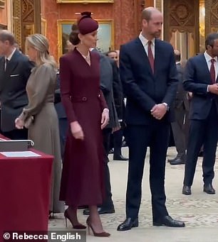 Kate swapped into a pair of £650 Gianvito Rossi 105 pumps in royal burgundy suede