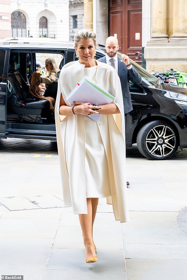 The 53-year-old Dutch royal picked an elegant calf-length cream dress for her visit on Wednesday - one day after she addressed the Financial Times Global Banking Summit