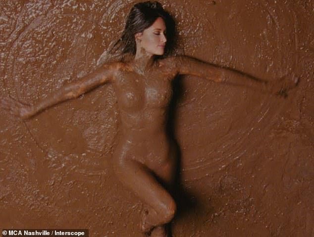 The seven-time Grammy winner covered her naked body in mud for the music video for her single The Architect, which premieres Wednesday morning at 9am PST