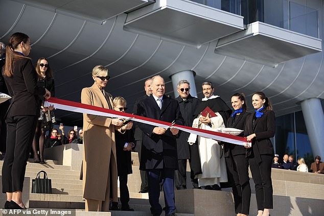 Prince Albert photographed cutting the ribbon at the inauguration of billion-dollar 'eco-district Mareterra in Monaco